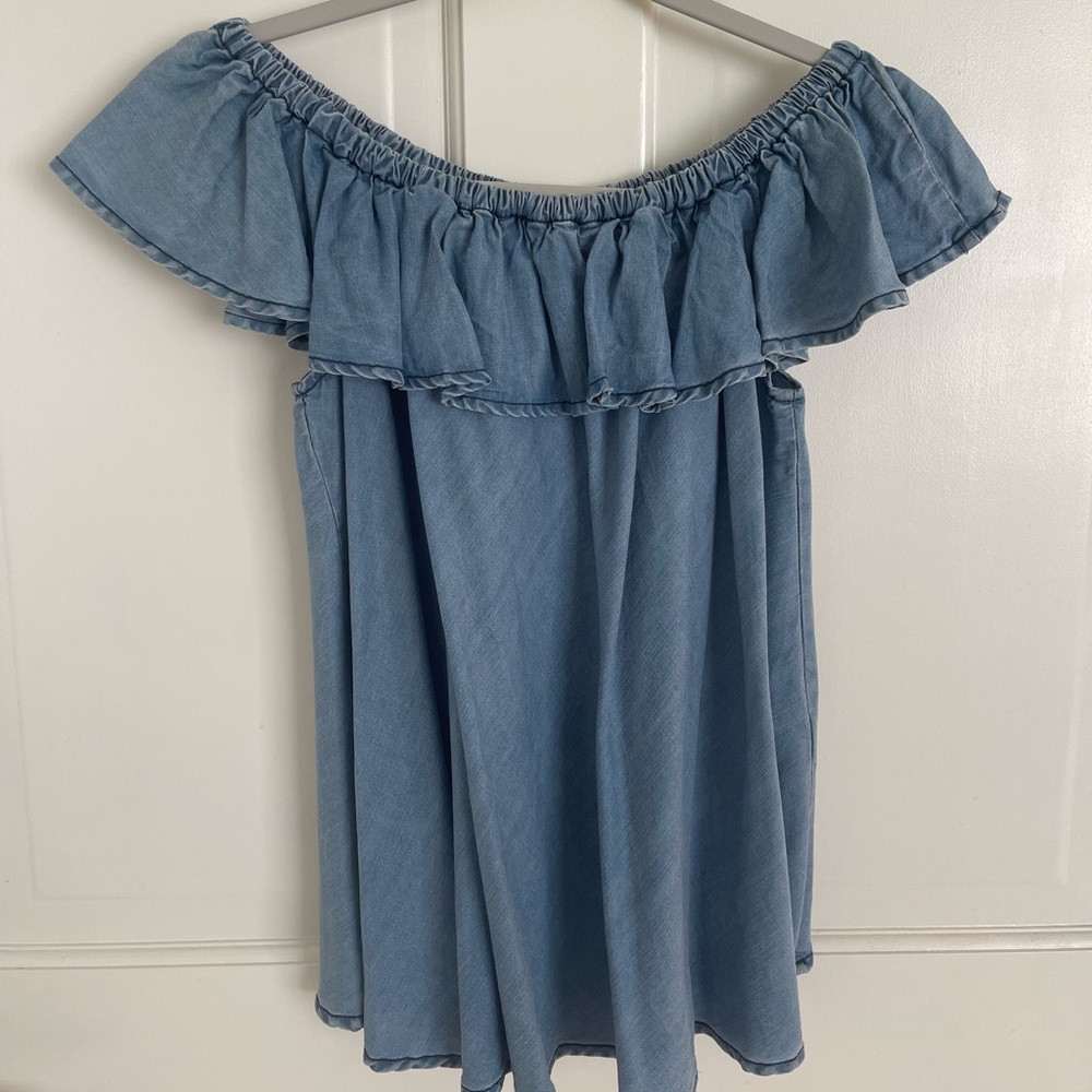Off the shoulder chambray ruffle shirt.